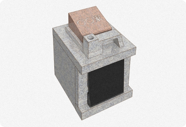 イラスト：直方体のお墓。上部に家名を刻んだプレートがついています。