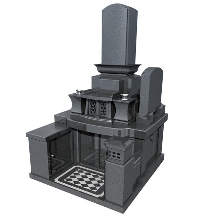 写真:右側に墓誌のあるお墓。敷石に菱形の飾り彫りがあります。