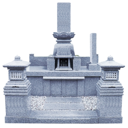 写真:敷石部分に砂利と飛石のある明るい色のお墓。右側に墓誌があります。